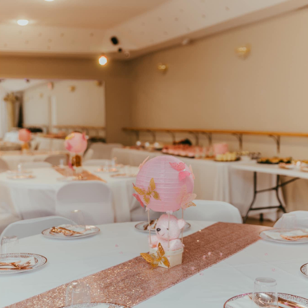 Rectangle buffet tables along the southern wall