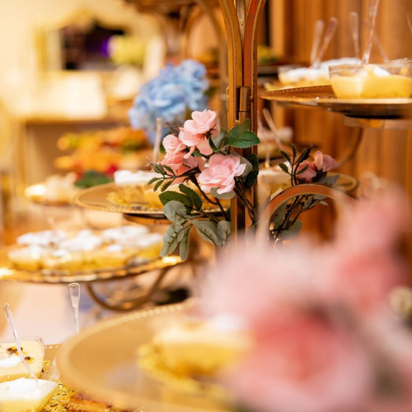 buffet line with desserts on tiered trays