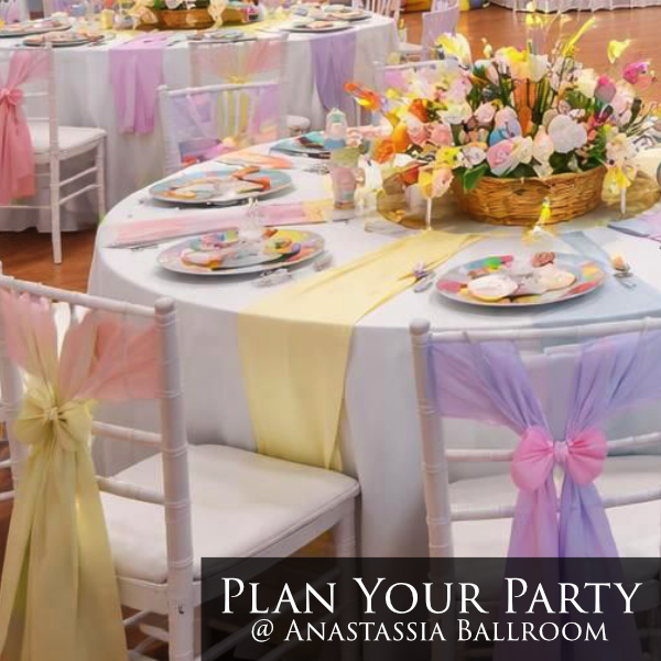 pastel yellow lilac and blue tones with colorful plates and bold bunny easter basket centerpieces